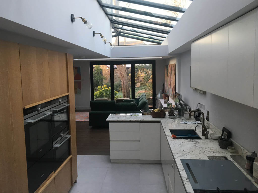 Separate utility room new glazed roof and full internal renovation including installation of new en-suite10